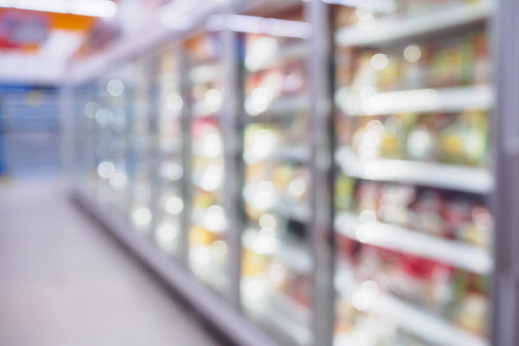 blurred refrigerator section of super market